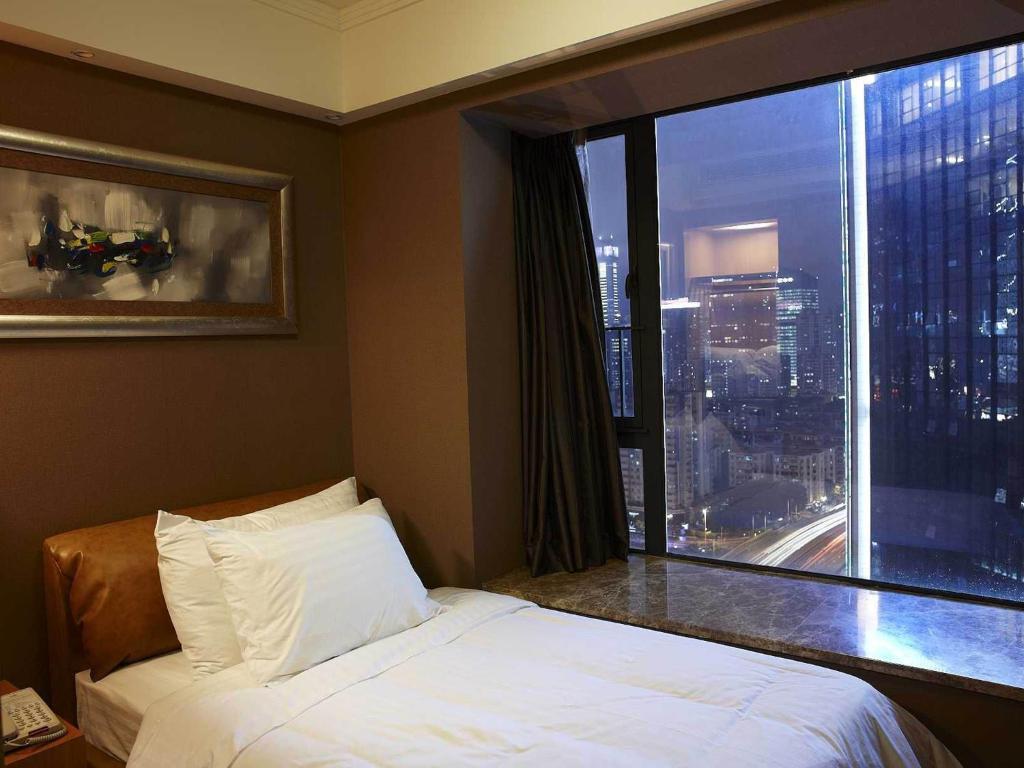 Dan Executive Hotel Apartment Zhujiang New Town Guangzhou Værelse billede